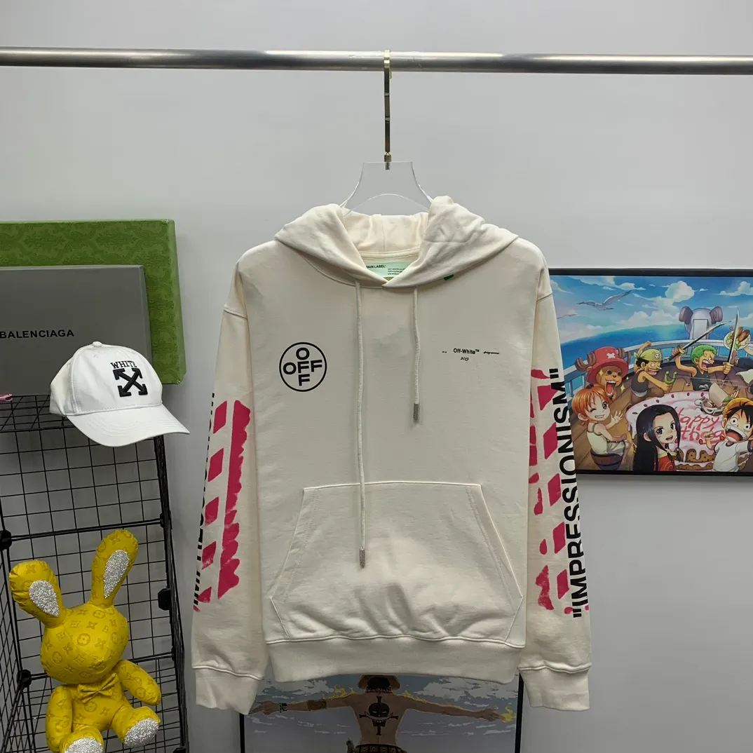 The top tested version OFF-WHITE (OW) 99 pink oil graffiti for men and women couples pure cotton loose pullover hooded sweatshirt jacket zipper professional handmade dot printing, delicate and full, strong color layering, the printing is breathable and non-sticky! The gradient of the layers is clear, the texture and texture are visible, the fabric and printing are completely combined, and the frosted feel is delicate. The fabric is made of 460g fish scale terry cotton fabric, which has a full drape. Customized zipper pull with OFFWHITE metal engraving on it and a concave feel. This is a must-see for identification. The hat rope pendant clock has metal engravings. This is a detail that is easily overlooked.  Like Monet's oil paintings, it has always occupied the top sales list on major domestic and foreign platforms, and offline stores can also be said to be often out of stock.  Couple matching, personalized and trendy! The style is elegant and classic, versatile for daily use. Couple style 👫 Can be worn by both men and women P: 390